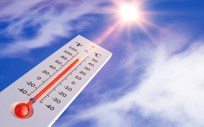 thermometer showing hot sun